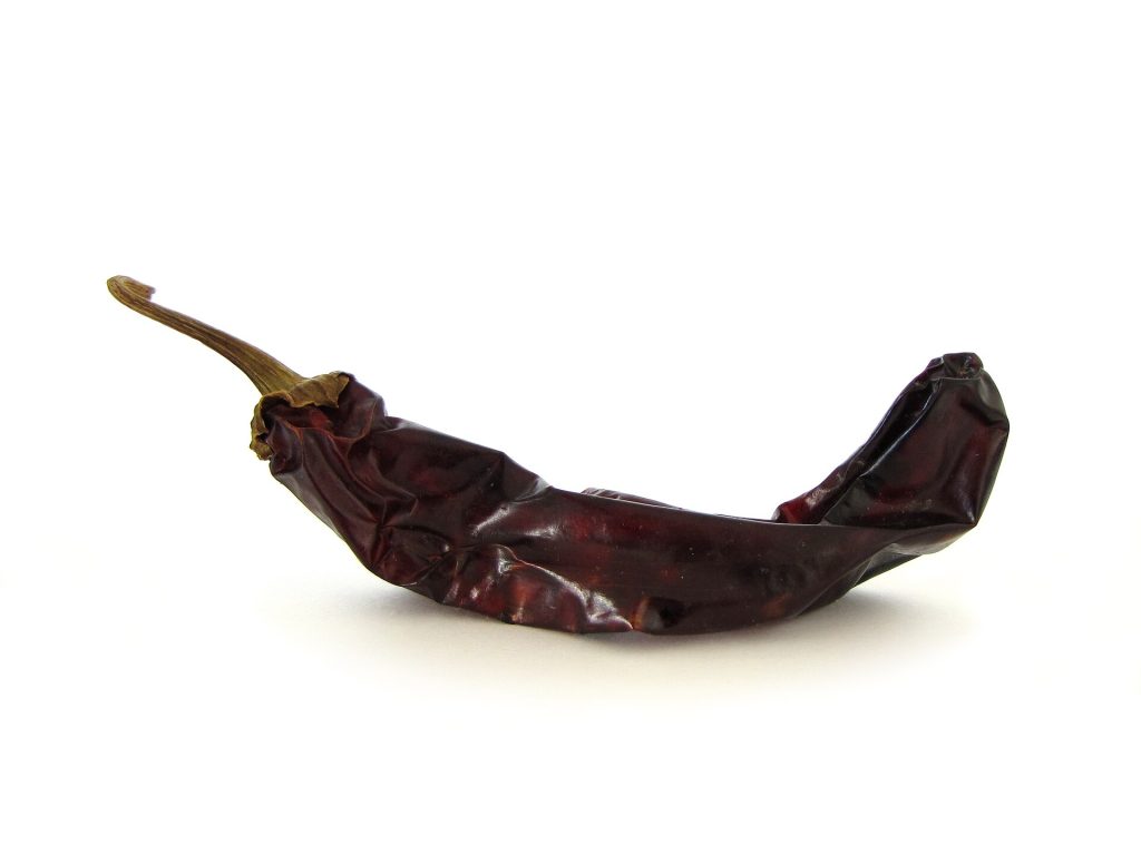 A pile of dried guajillo and ancho chiles
