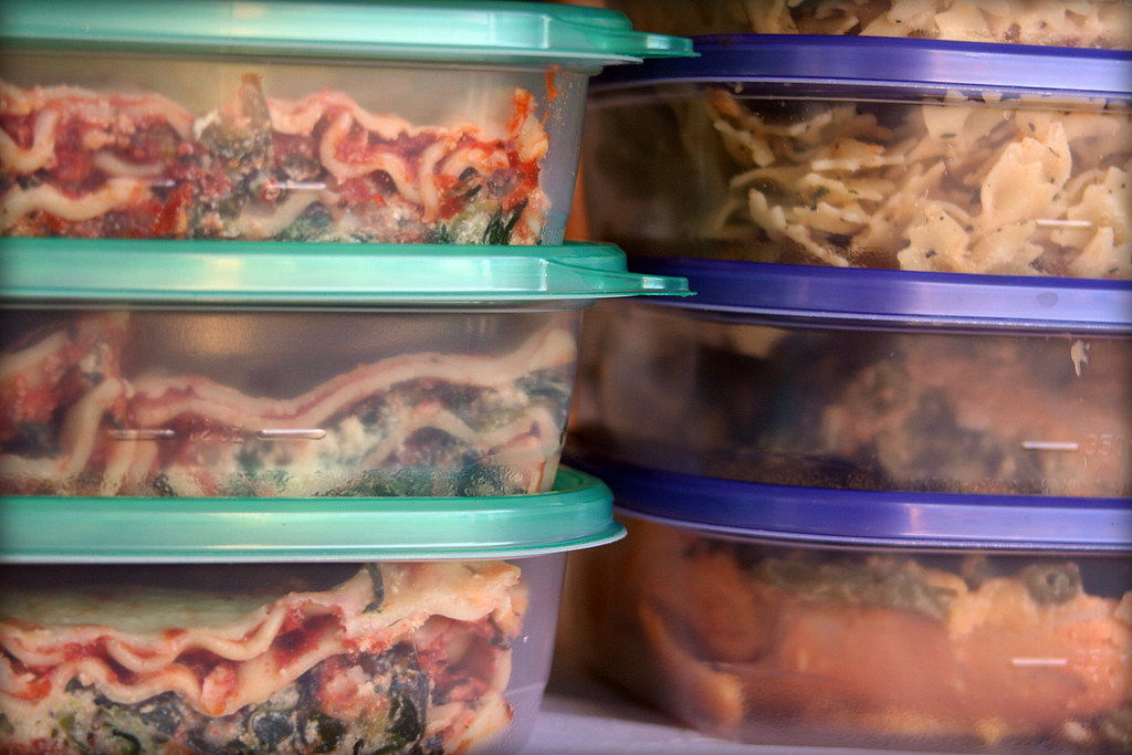 Holiday leftovers packed in shallow food storage containers
