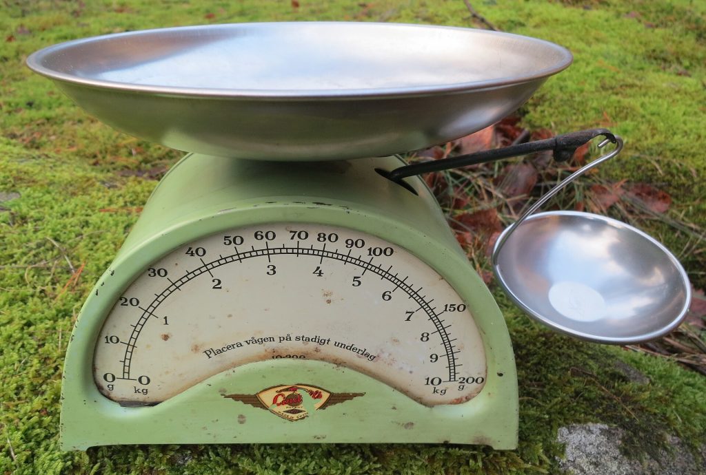 Ingredients being weighed on a digital kitchen scale