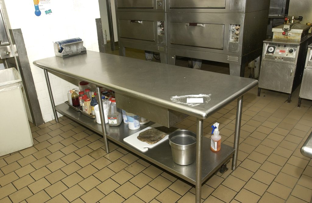 A restaurant kitchen under renovation with new equipment