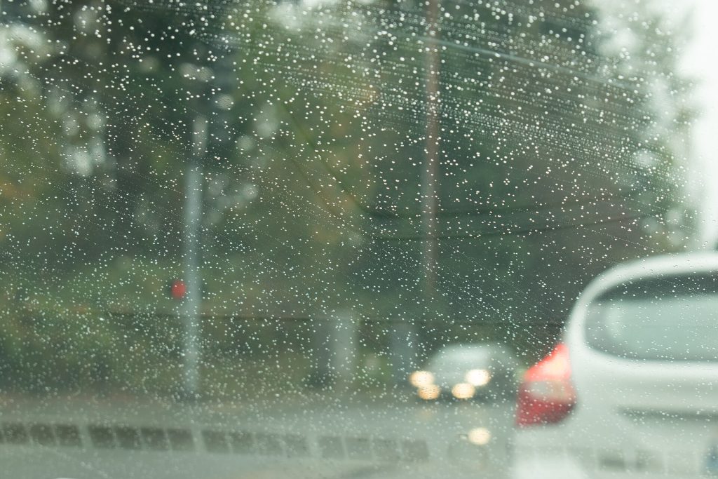 Raindrops on windshield in Kent, Washington