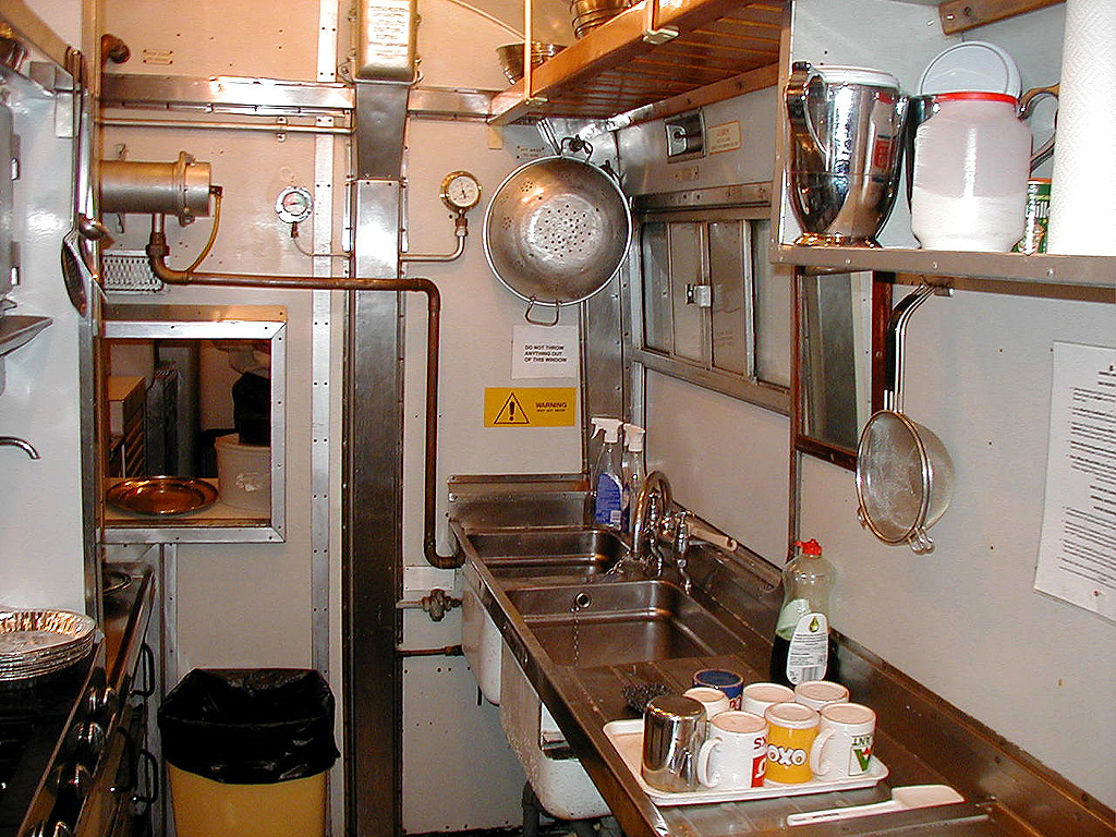 A stainless steel commercial kitchen line during service